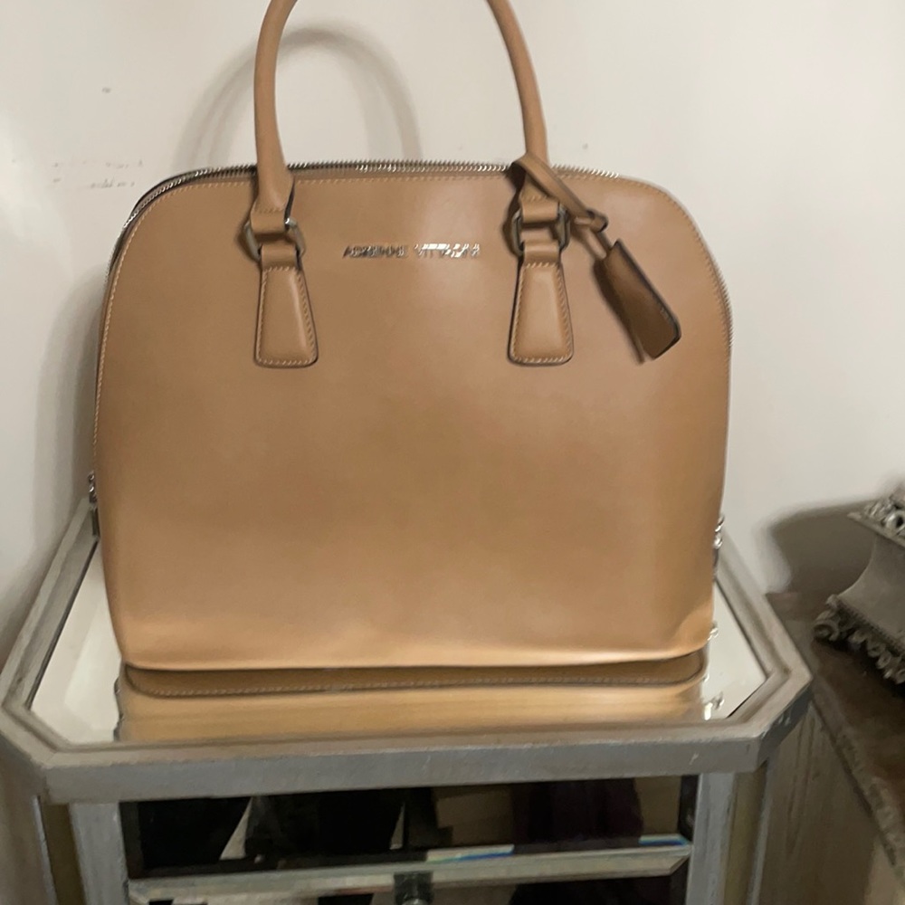 A brown/tan Adrienne Vittadini purse